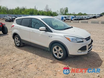 Czwarte zdjęcie samochodu z boku: 2014 FORD ESCAPE SE VIN:1FMCU0GX9EUB29242 - miniatura