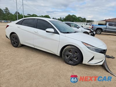 Czwarte zdjęcie samochodu z boku: 2021 HYUNDAI ELANTRA SEL VIN:5NPLM4AG4MH017459 - miniatura