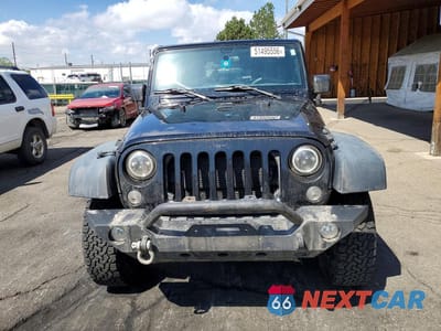 Piąte zdjęcie samochodu w środku: 2015 JEEP WRANGLER SPORT VIN:1C4AJWAG9FL560736 - miniatura