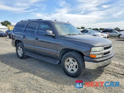 Czwarte zdjęcie samochodu z boku: 2004 CHEVROLET TAHOE C1500 VIN:1GNEC13V84R168696 - miniatura