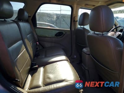Zdjęcie 11 z 13 samochodu: 2004 FORD ESCAPE LIMITED VIN:1FMCU94164KB68904 - miniatura