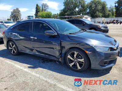 Czwarte zdjęcie samochodu z boku: 2016 HONDA CIVIC TOURING VIN:19XFC1F95GE033607 - miniatura