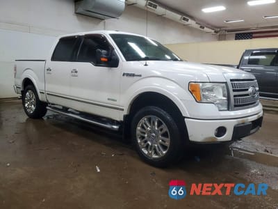 Czwarte zdjęcie samochodu z boku: 2011 FORD F150 SUPERCREW VIN:1FTFW1ET9BFA81517 - miniatura