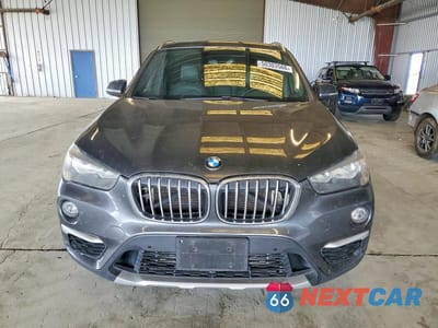 Piąte zdjęcie samochodu w środku: 2018 BMW X1 XDRIVE28I VIN:WBXHT3C30J5K31053 - miniatura