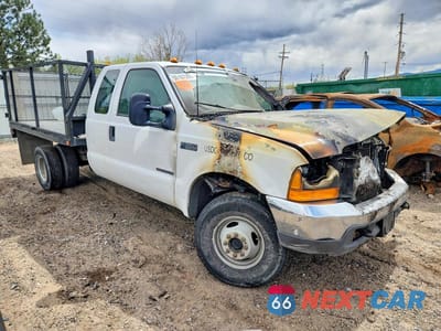 Czwarte zdjęcie samochodu z boku: 2000 FORD F350 SUPER DUTY VIN:1FDWX37F4YEA16942 - miniatura