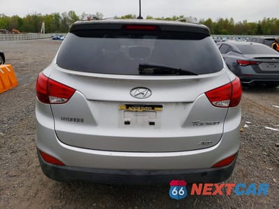 Zdjęcie 6 z 13 samochodu: 2010 HYUNDAI TUCSON GLS VIN:KM8JUCAC8AU046409 - miniatura