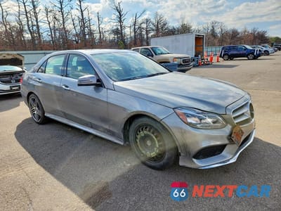 Czwarte zdjęcie samochodu z boku: 2014 MERCEDES-BENZ E 350 4MATIC VIN:WDDHF8JB6EA802799 - miniatura