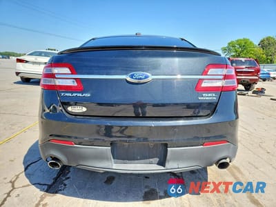 Zdjęcie 6 z 12 samochodu: 2014 FORD TAURUS SEL VIN:1FAHP2E84EG170889 - miniatura