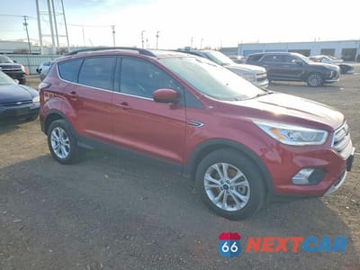 Czwarte zdjęcie samochodu z boku: 2018 FORD ESCAPE SEL VIN:1FMCU9HD8JUB52126 - miniatura