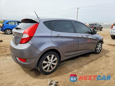 Trzecie zdjęcie samochodu z tyłu: 2014 HYUNDAI ACCENT SE VIN:KMHCU5AE5EU154272 - miniatura
