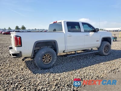 Trzecie zdjęcie samochodu z tyłu: 2017 GMC SIERRA K1500 SLT VIN:3GTU2NEJ2HG405780 - miniatura