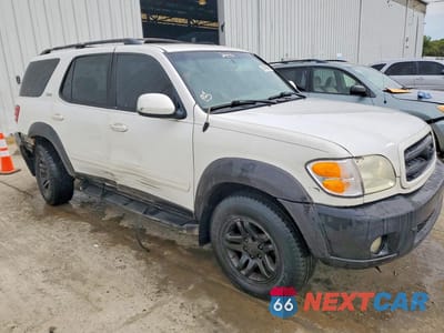 Czwarte zdjęcie samochodu z boku: 2003 TOYOTA SEQUOIA SR5 VIN:5TDBT44A73S167239 - miniatura