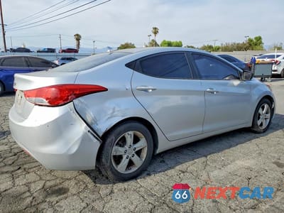 Trzecie zdjęcie samochodu z tyłu: 2013 HYUNDAI ELANTRA GLS VIN:KMHDH4AE0DU867713 - miniatura