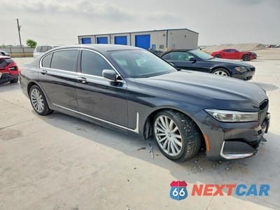 Czwarte zdjęcie samochodu z boku: 2022 BMW 740 I VIN:WBA7T2C07NCH07471 - miniatura