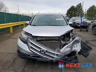 Piąte zdjęcie samochodu w środku: 2012 HONDA CR-V EXL VIN:JHLRM4H7XCC010433 - miniatura