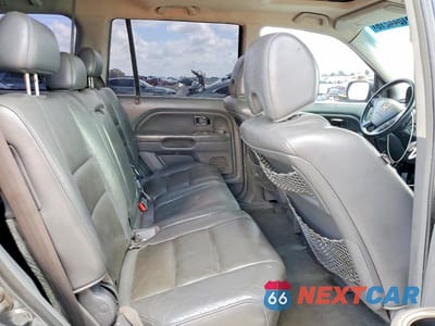 Zdjęcie 11 z 13 samochodu: 2006 HONDA PILOT EX VIN:2HKYF18716H553678 - miniatura