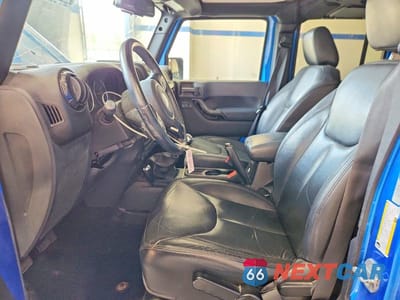 Zdjęcie 7 z 11 samochodu: 2015 JEEP WRANGLER UNLIMITED SAHARA VIN:1C4BJWEG8FL685189 - miniatura