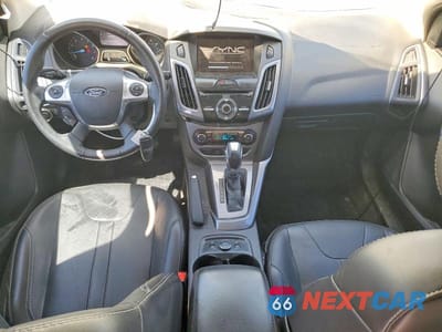 Zdjęcie 8 z 13 samochodu: 2014 FORD FOCUS TITANIUM VIN:1FADP3N26EL299837 - miniatura