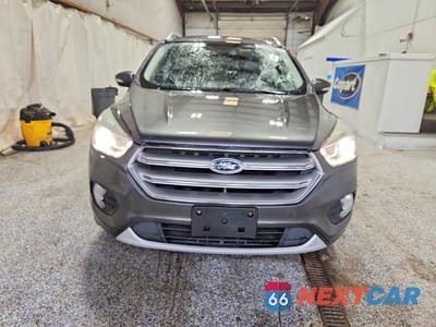 Piąte zdjęcie samochodu w środku: 2017 FORD ESCAPE TITANIUM VIN:1FMCU9J9XHUC57797 - miniatura