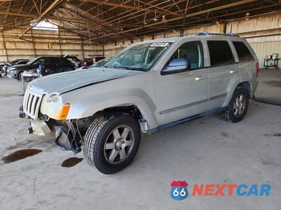 2010 JEEP GRAND CHEROKEE LAREDO 1J4PR4GK3AC130688 - główne zdjęcie licytacji z USA - miniatura
