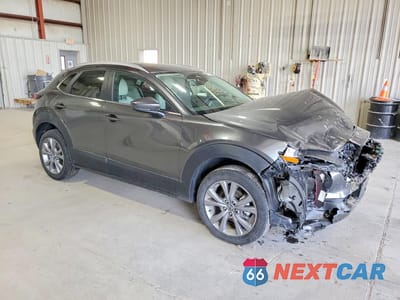 Czwarte zdjęcie samochodu z boku: 2024 MAZDA CX-30 PREFERRED VIN:3MVDMBCM0RM671015 - miniatura