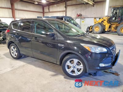 Czwarte zdjęcie samochodu z boku: 2015 FORD ESCAPE SE VIN:1FMCU0GX8FUA08011 - miniatura