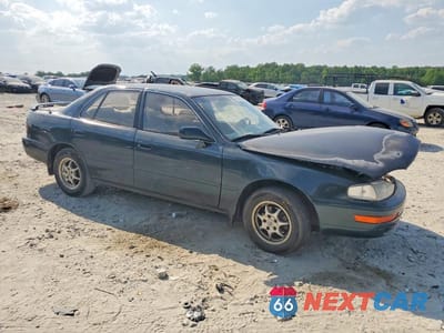 Czwarte zdjęcie samochodu z boku: 1994 TOYOTA CAMRY LE VIN:JT2SK12E9R0250330 - miniatura