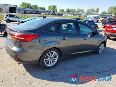Trzecie zdjęcie samochodu z tyłu: 2016 FORD FOCUS SE VIN:1FADP3F2XGL382494 - miniatura