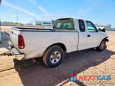 Trzecie zdjęcie samochodu z tyłu: 2001 FORD F150 VIN:1FTRX17W01NA87728 - miniatura