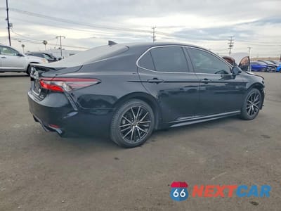 Trzecie zdjęcie samochodu z tyłu: 2024 TOYOTA CAMRY HYBRID SE VIN:4T1S31AK9RU621017 - miniatura