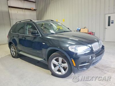 Czwarte zdjęcie samochodu z boku: 2013 BMW X5 XDRIVE50I VIN:5UXZV8C51D0C15957 - miniatura