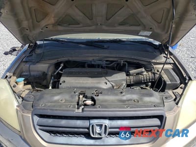 Zdjęcie 12 z 14 samochodu: 2004 HONDA PILOT VIN:2HKYF18674H512086 - miniatura