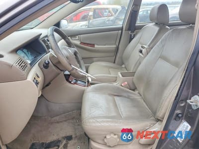 Zdjęcie 7 z 11 samochodu: 2003 TOYOTA COROLLA LE VIN:1NXBR38E63Z124220 - miniatura