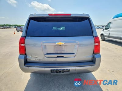 Zdjęcie 6 z 12 samochodu: 2020 CHEVROLET SUBURBAN C1500 LT VIN:1GNSCHKC3LR120145 - miniatura