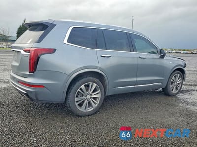 Trzecie zdjęcie samochodu z tyłu: 2022 CADILLAC XT6 PREMIUM LUXURY VIN:1GYKPDRS4NZ107677 - miniatura