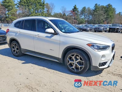 Czwarte zdjęcie samochodu z boku: 2017 BMW X1 XDRIVE28I VIN:WBXHT3C37H5F79865 - miniatura