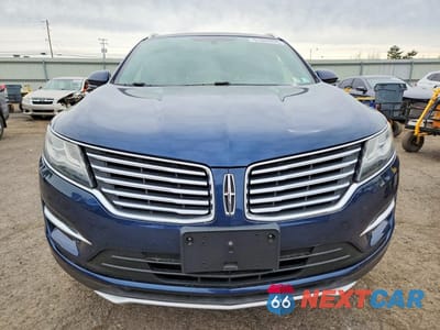 Piąte zdjęcie samochodu w środku: 2016 LINCOLN MKC PREMIERE VIN:5LMCJ1D97GUJ02965 - miniatura