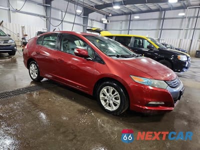 Czwarte zdjęcie samochodu z boku: 2010 HONDA INSIGHT EX VIN:JHMZE2H75AS016849 - miniatura