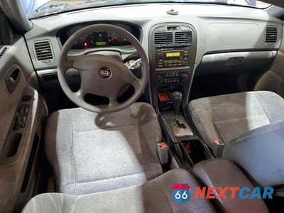 Zdjęcie 8 z 13 samochodu: 2003 KIA OPTIMA LX VIN:KNAGD126X35214492 - miniatura
