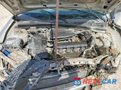 Zdjęcie 11 z 12 samochodu: 2005 HONDA CIVIC LX VIN:1HGEM22675L019921 - miniatura