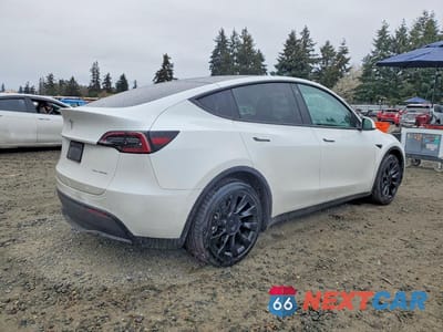 Trzecie zdjęcie samochodu z tyłu: 2022 TESLA MODEL Y VIN:7SAYGDEE7NF316064 - miniatura