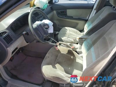 Zdjęcie 7 z 12 samochodu: 2004 KIA SPECTRA LX VIN:KNAFE121045018995 - miniatura