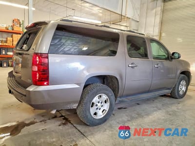 Trzecie zdjęcie samochodu z tyłu: 2012 CHEVROLET SUBURBAN K1500 LT VIN:1GNSKJE71CR180899 - miniatura
