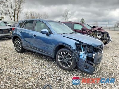 Czwarte zdjęcie samochodu z boku: 2016 MAZDA CX-5 GT VIN:JM3KE4DY5G0822909 - miniatura