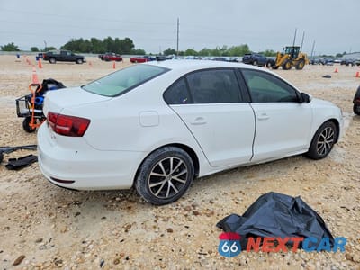 Trzecie zdjęcie samochodu z tyłu: 2017 VOLKSWAGEN JETTA SE VIN:3VWB67AJXHM321184 - miniatura