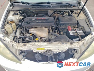 Zdjęcie 11 z 11 samochodu: 2003 TOYOTA CAMRY LE VIN:4T1BE32K43U229641 - miniatura