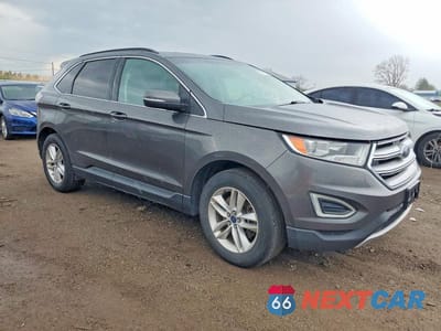 Czwarte zdjęcie samochodu z boku: 2015 FORD EDGE SEL VIN:2FMTK4J9XFBB19821 - miniatura