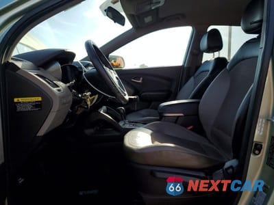 Zdjęcie 7 z 13 samochodu: 2011 HYUNDAI TUCSON GLS VIN:KM8JU3AC2BU291014 - miniatura