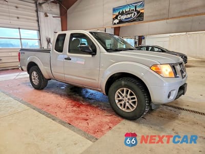 Czwarte zdjęcie samochodu z boku: 2014 NISSAN FRONTIER SV V6 VIN:1N6AD0CW4EN737458 - miniatura