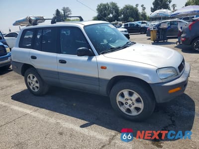 Czwarte zdjęcie samochodu z boku: 1997 TOYOTA RAV4 BASE VIN:JT3GP10VXV7019668 - miniatura